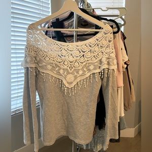 Off the shoulder grey and white sweater